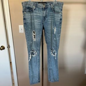 Mid rise ripped girlfriend jeans